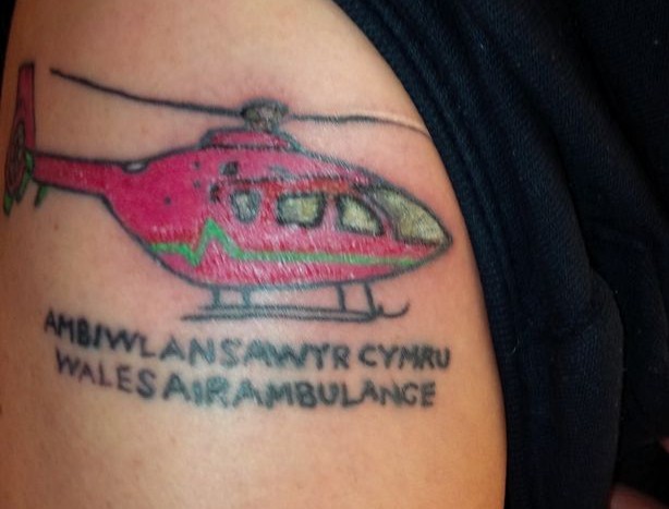 Strange Tattoos: Your Air Ambulance Service on arms