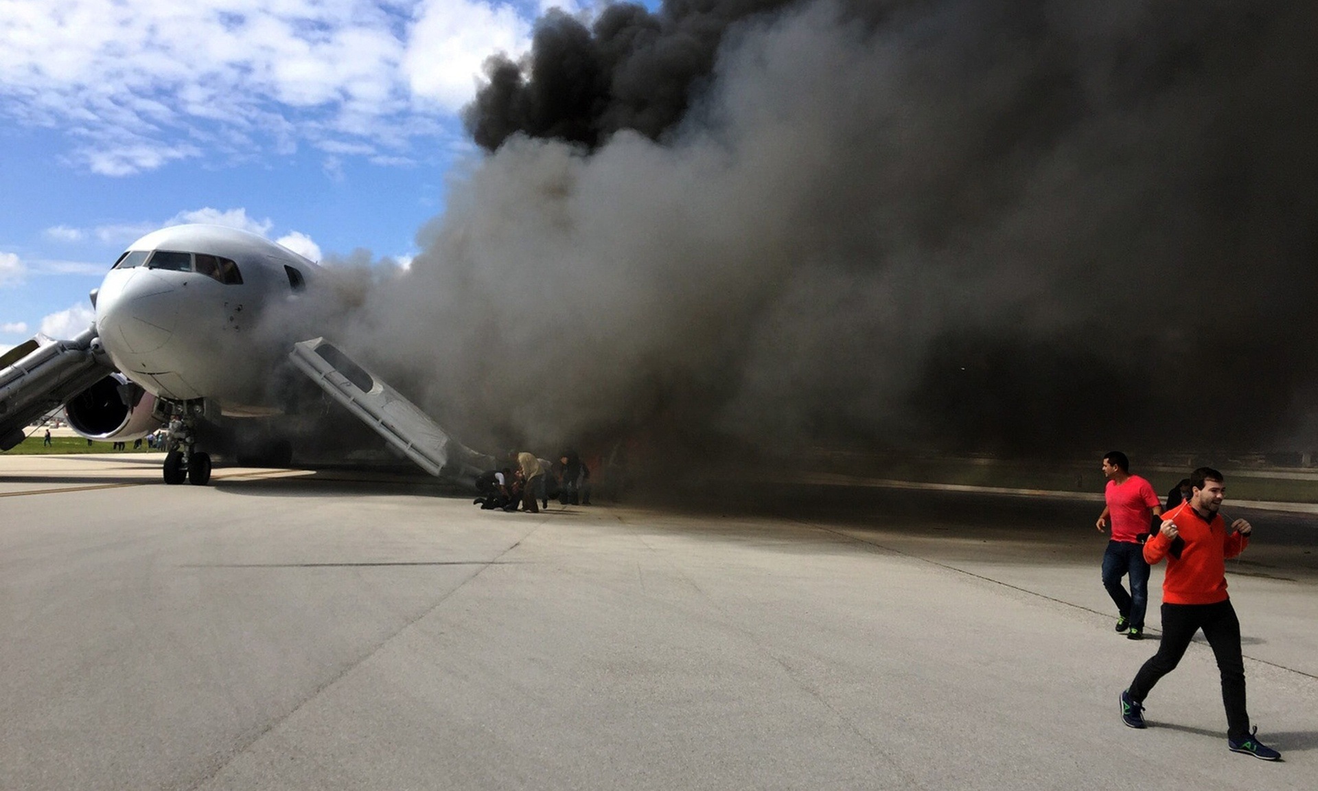 Jet catches fire at Fort Lauderdale airport, Florida