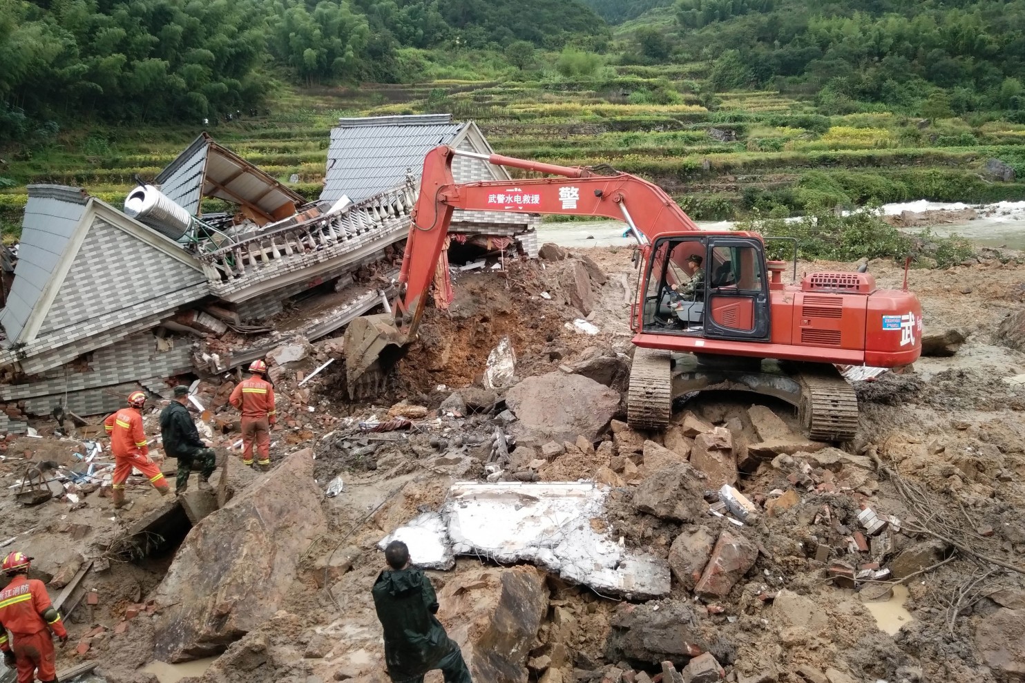 China reports 6 dead, 23 missing in typhoon landslides